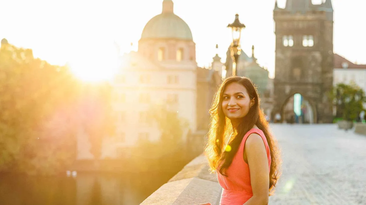 An empty Charles Bridge at first light during a Prague sunrise photoshoot with a licensed guide, Prague